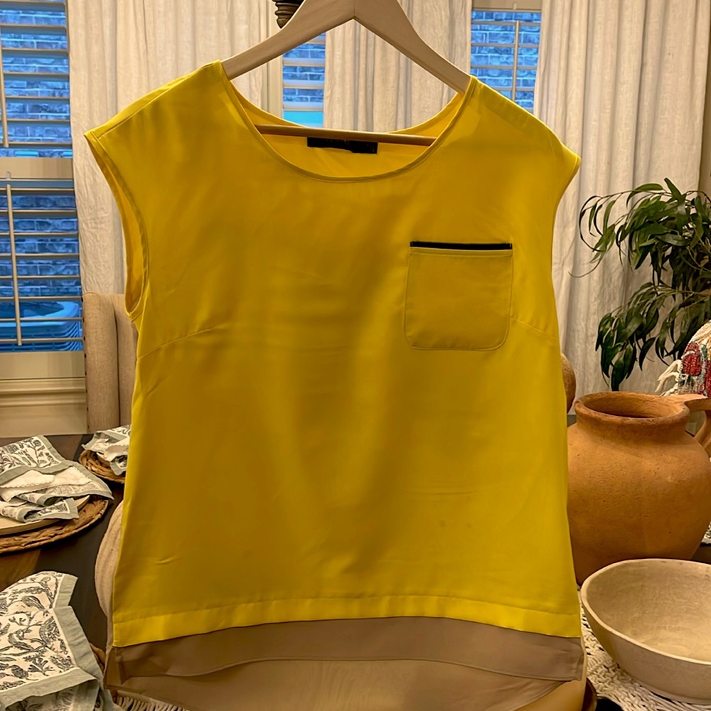 The Limited size Medium blouse 100% polyester.